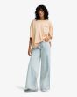 Mujer con Camiseta de manga corta Billabong Waterfall color melocotón corte holgado