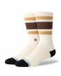 Calcetines Stance Boyd Crew Dark Brown vistos de perfil, con diseño retro a rayas marrón y beige sobre fondo crema