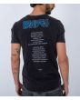 Hombre con camiseta de manga corta Hurley Oceancare Tour negra serigrafia Hurley Tour espalda