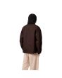 Hombre con abrigo Carhartt WIP Michigan Coat Winter Marrón Tobacco y Negro posterior