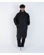 Hombre con Chubasquero largo tipo poncho cambiador Hurley Ice Poncho Sherpa negro