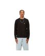 Hombre con jersey de lana Carhartt WIP Madison Sweater Negro-Cera