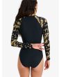 Licra de surf Roxy mujer con manga larga y cremallera negra con estampado floral posterior
