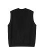 Chaleco tipo jersey Carhartt WIP Madison Vest Sweater Negro con logo blanco para hombre posterior
