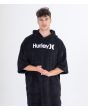 Hombre con Poncho de Surf Hurley One & Only negro Unisex frontal