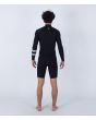 Hombre con traje de surf de primavera con manga larga y cremallera en el pecho Hurley Advant 2/2mm Springsuit Negro posterior