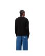 Hombre con Sudadera Carhartt WIP Script Embroidery Sweatshirt Negra con logo blanco posterior