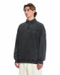 Hombre con sudadera Volcom Single Stone Quarter Zip negra lavado ácido lateral