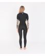 Mujer con traje de neopreno con cremallera en el pecho Hurley Advantage Plus 3/2mm negro y amarillo posterior
