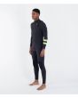 Hombre con traje de surf Hurley Plus 4/3mm Fullsuit Negro-Lemon izquierda