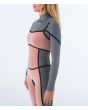 Mujer con traje de surf con cremallera en el pecho Hurley Plus 4/3mm negro grafito interior manga