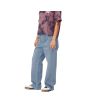 Mujer con pantalones vaqueros holgados Carhartt WIP Simple Pant Azul Lavado Ligero lateral