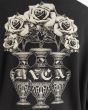 Hombre con Sudadera de capucha RVCA Benjamin Jeanjean Bouquet Negra estampado floral