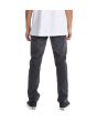 Hombre con Vaquero de corte ajustado DC Shoes Worker Slim Gris Oscuro posterior