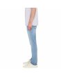 Hombre con pantalón vaquero Volcom Vorta Denim Slim Wrecked Indigo lateral