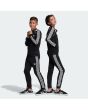 Niño y niña con Pantalón de chándal Adidas Junior Superstar Pants negro y blanco 