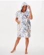 Mujer con toalla de playa con capucha Rip Curl Diamond Bay floral bolsillo