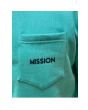 Hombre con Sudadera Mission Pocket Logo Montalvo verde turquesa Unisex bolsillo