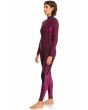Mujer con traje de neopreno con cremallera en el pecho Roxy Elite 3/2mm negro floral interior lateral