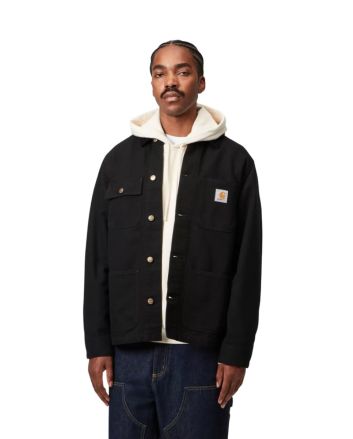 Hombre con chaqueta Carhartt WIP Michigan Coat negra